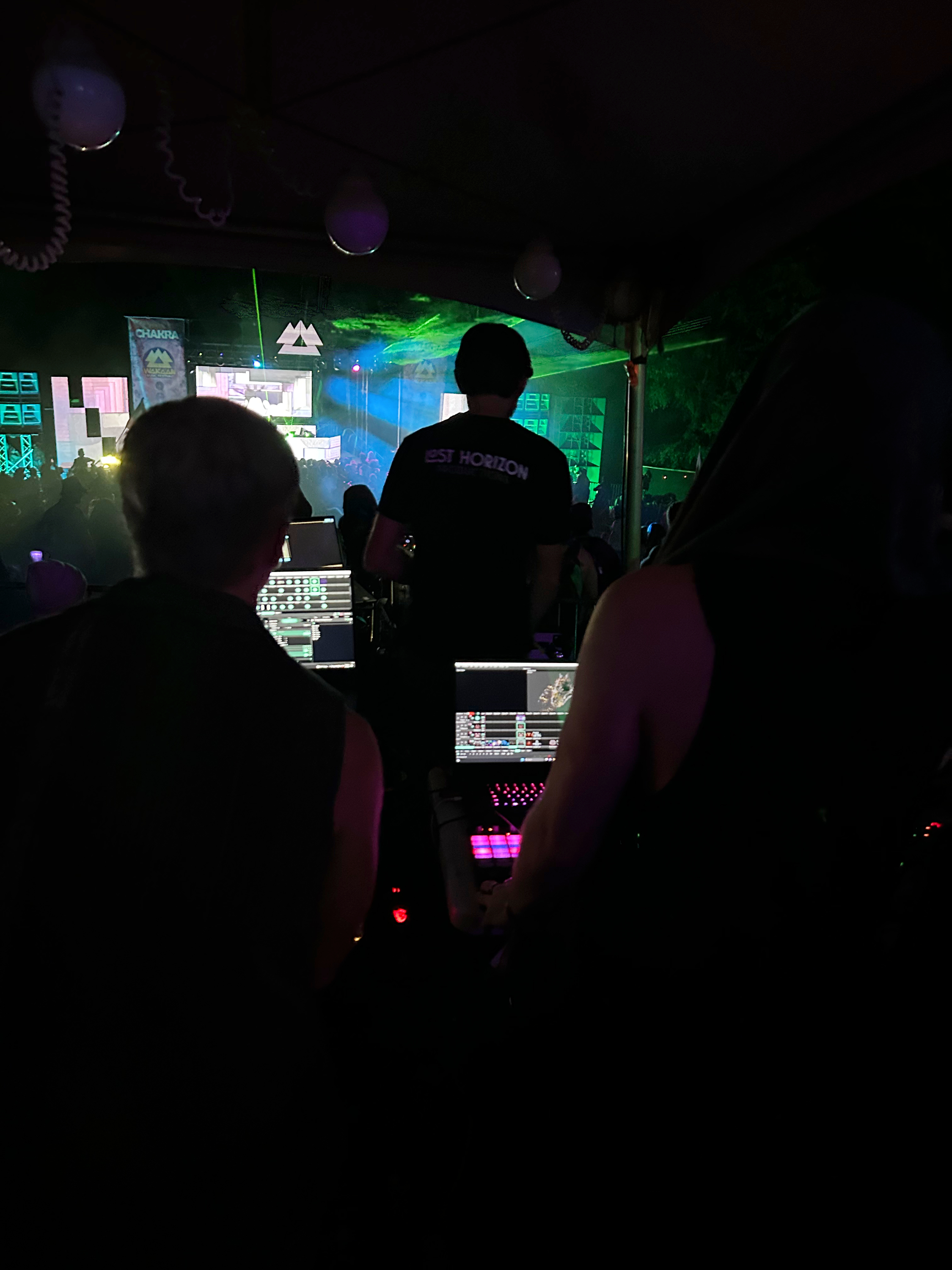 Rob and Rex performing live visuals at a festival